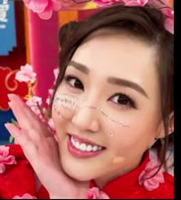 Decorative face details and defined eye makeup